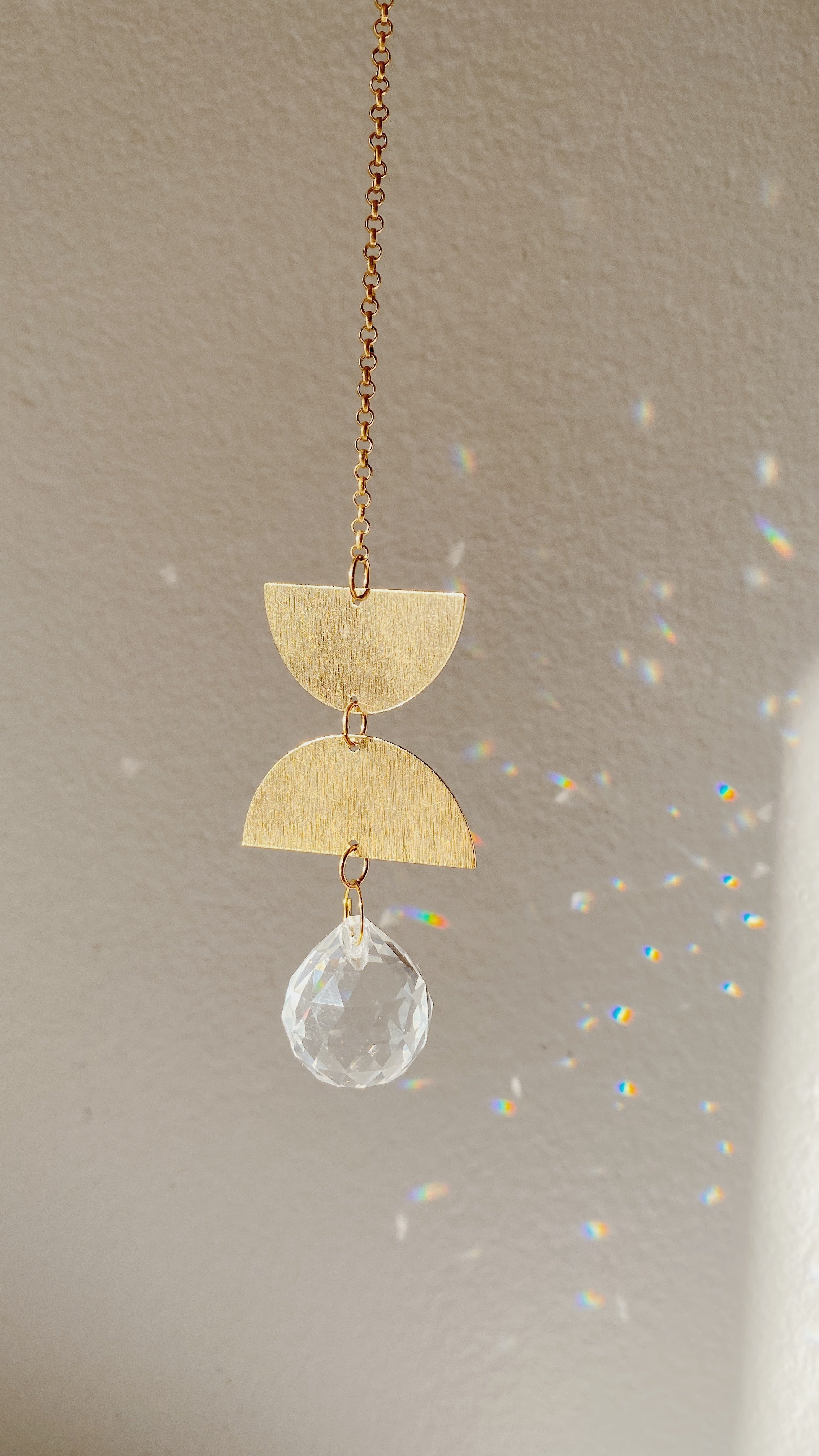 Hanging suncatcher crafted with brass and crystal - Balance Mini